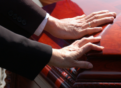 Hands On A Coffin
